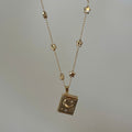 Gold Celestial Locket Necklace, Moon and Star Necklace